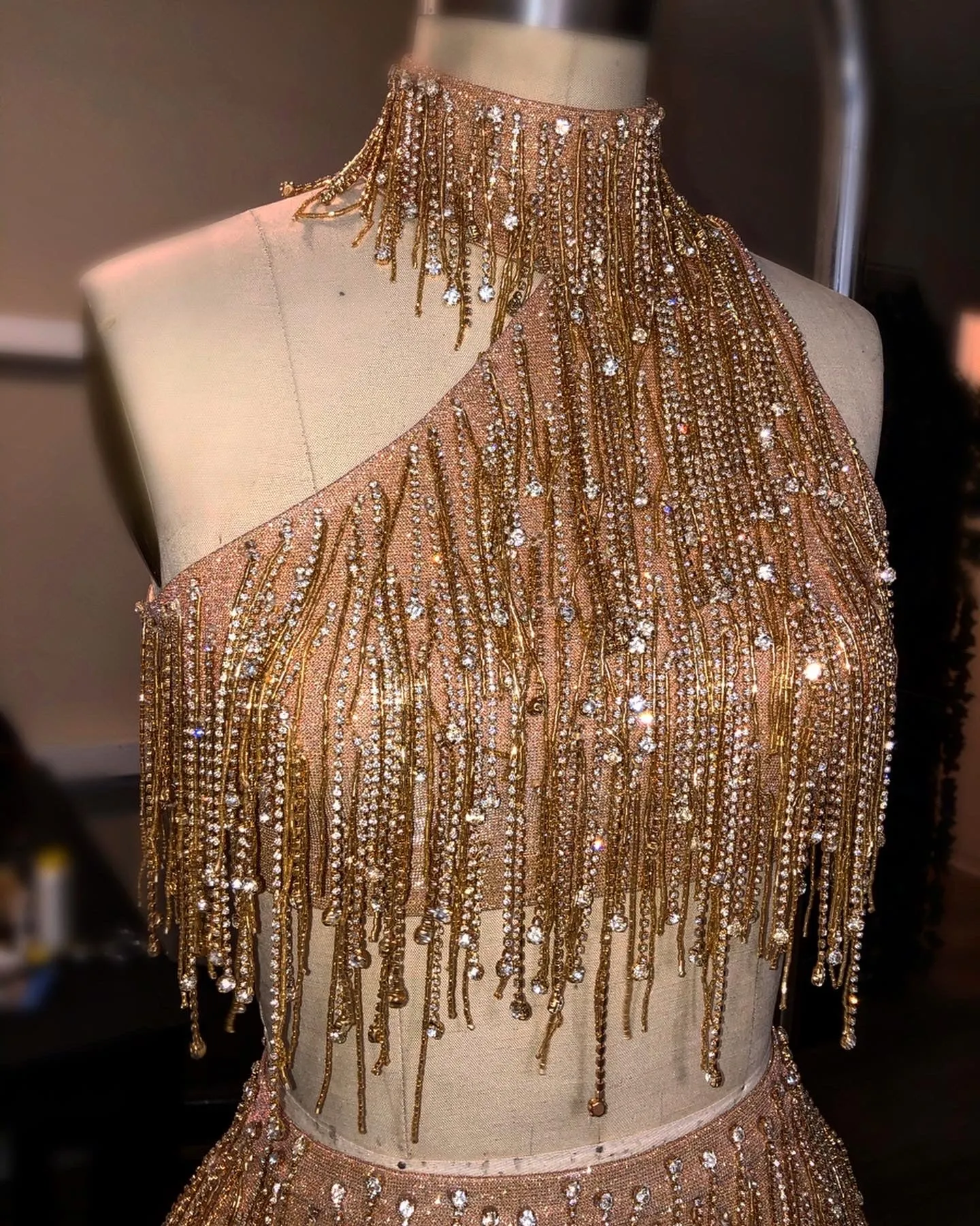 Cosmic Asymmetrical Fringe Peach And Gold Two Piece Look