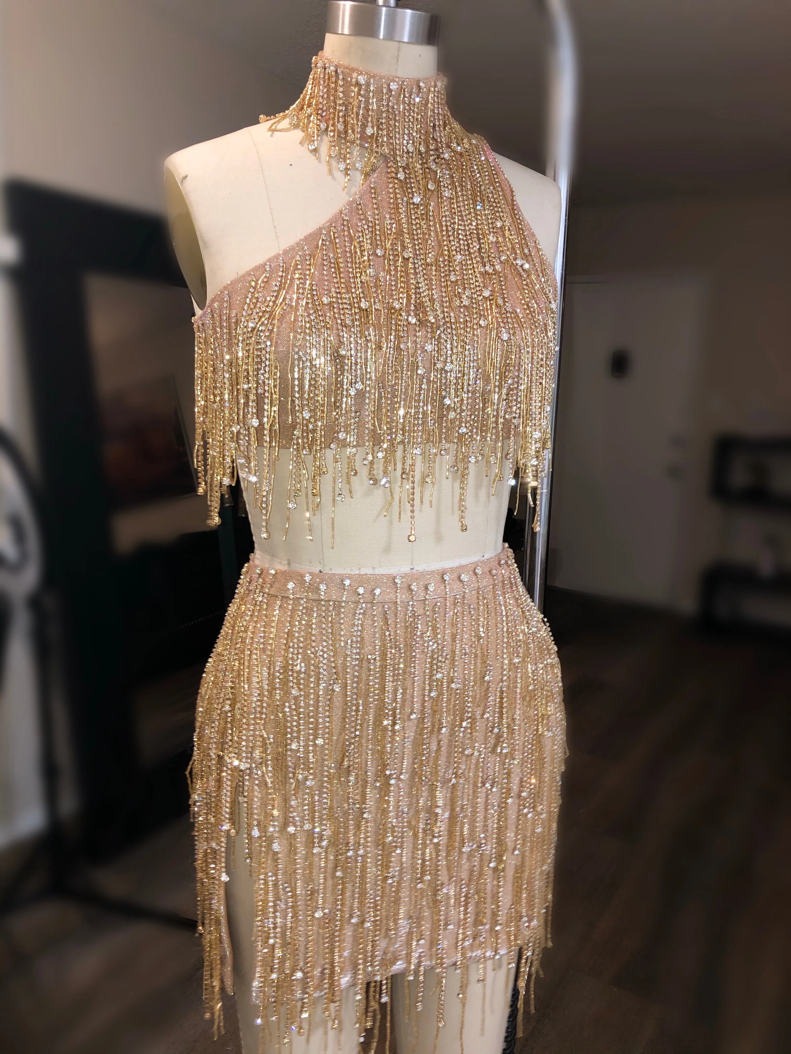 Cosmic Asymmetrical Fringe Peach And Gold Two Piece Look