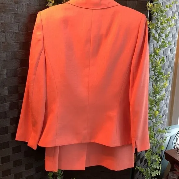 Le Suit Size 8 two-piece skirt/blazer set.  Tangerine/orange