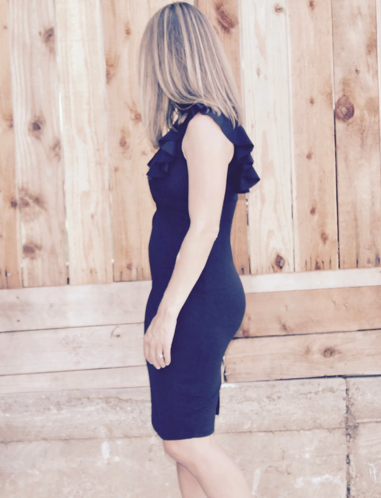 RUFFLE TRIM VENTED BLACK DRESS