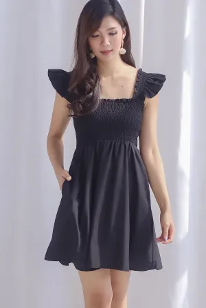 Shayna Smocked Ruffle Strap Romper Dress In Black